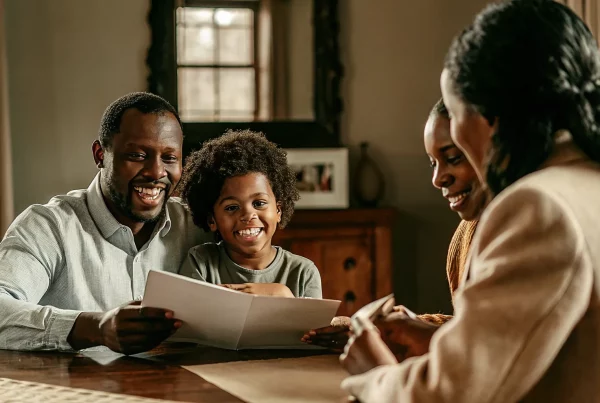 citizenship-by-descent-for-adopted-children-canada-how-the-first-generation-limit-repeal-affects-adopted-children-of-canadian-citizens-154684 - Nanua & Ioffe Lawyers A diverse family with an adopted child reviewing Canadian citizenship documents together